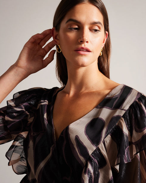 JASMYNA-Tops-Ruffled to perfection and finished with a bow, JASMYNA is your ticket to style heaven. Bottomless brunch? More like your own personal catwalk.The fabric of this product is made of 100% recycled polyester. Using recycled polyester helps divert plastic waste from ending in landfills and helps us to reduce our dependancy on virgin materials. Ruffled top V-neck Abstract print Short sleeved Low back with tie fastening and zip Amy is 5'9.5" / 1.77m and wears Black in a Ted size 1- Ted Baker Romania